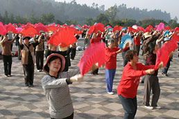Fitness dance exercises with fans