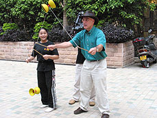 Peter trying to perfect diablo, Guangzhou Acrobatic Troupe and School