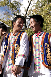 Naxi men dancing in Old Lijiang central square