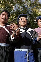 Naxi women dancing in Old Lijiang central square